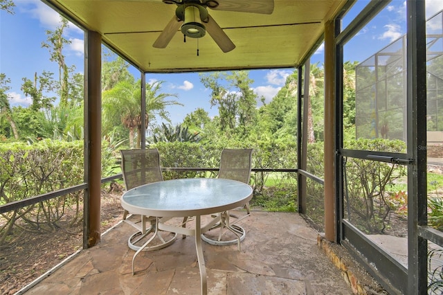 2103 N Golfview Dr, Plant City, FL 33566 - sunroom featuring a ceiling fan and outdoor dining space