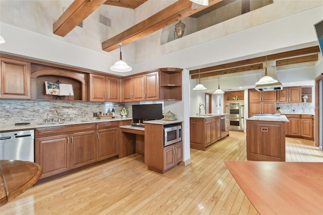2103 N Golfview Dr, Plant City, FL 33566 - kitchen with open shelves, stainless steel appliances, brown cabinets, decorative backsplash, and beam ceiling