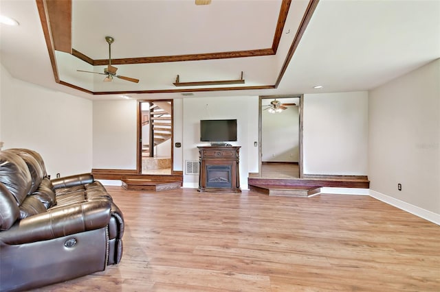 2103 N Golfview Dr, Plant City, FL 33566 - living room with a ceiling fan, stairs, a fireplace, light wood-style floors, and recessed lighting
