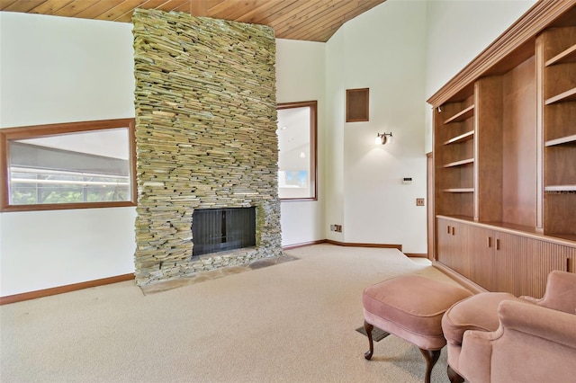 2103 N Golfview Dr, Plant City, FL 33566 - carpeted living area featuring a fireplace, high vaulted ceiling, and wood ceiling