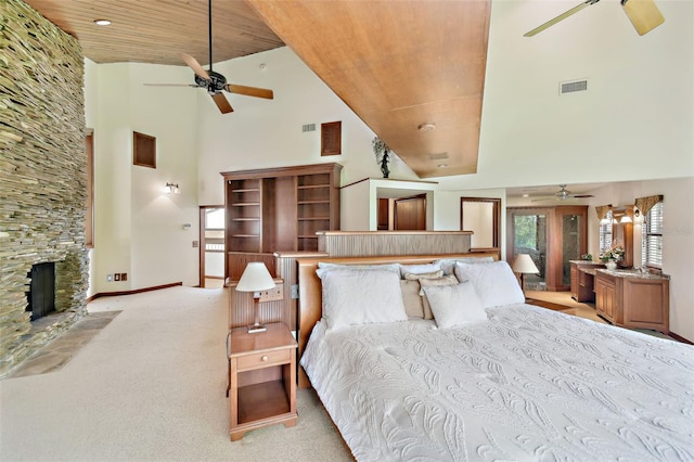 2103 N Golfview Dr, Plant City, FL 33566 - bedroom featuring high vaulted ceiling, wooden ceiling, a fireplace, and light colored carpet