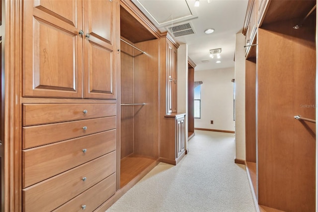 2103 N Golfview Dr, Plant City, FL 33566 - spacious closet featuring attic access and light carpet