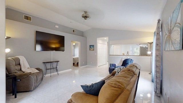 7010 Kendall Heath Way, Land O Lakes, FL 34637 - living area with lofted ceiling and baseboards