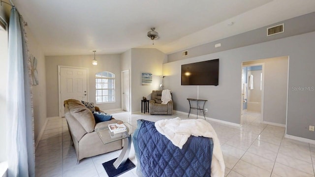 7010 Kendall Heath Way, Land O Lakes, FL 34637 - living area with lofted ceiling and light tile patterned floors
