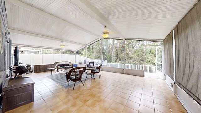 7010 Kendall Heath Way, Land O Lakes, FL 34637 - sunroom / solarium with outdoor lounge area and a ceiling fan