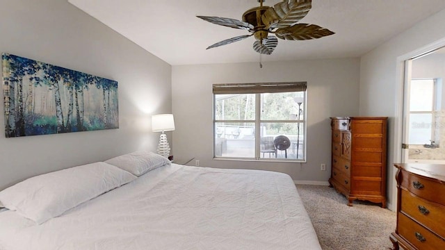 7010 Kendall Heath Way, Land O Lakes, FL 34637 - bedroom featuring light carpet and a ceiling fan