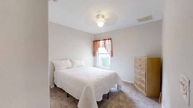 7010 Kendall Heath Way, Land O Lakes, FL 34637 - bedroom with light carpet and ceiling fan