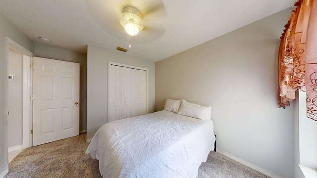 7010 Kendall Heath Way, Land O Lakes, FL 34637 - bedroom featuring carpet flooring, a closet, and ceiling fan