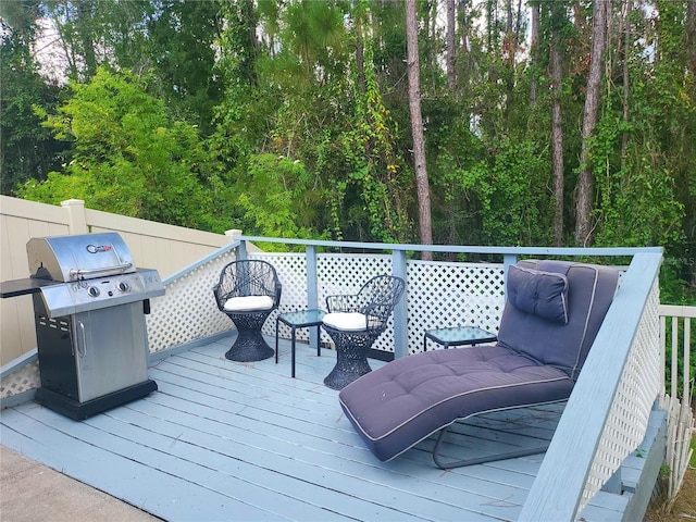 7010 Kendall Heath Way, Land O Lakes, FL 34637 - wooden terrace with area for grilling