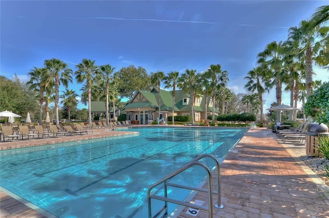 7010 Kendall Heath Way, Land O Lakes, FL 34637 - community pool featuring a patio area