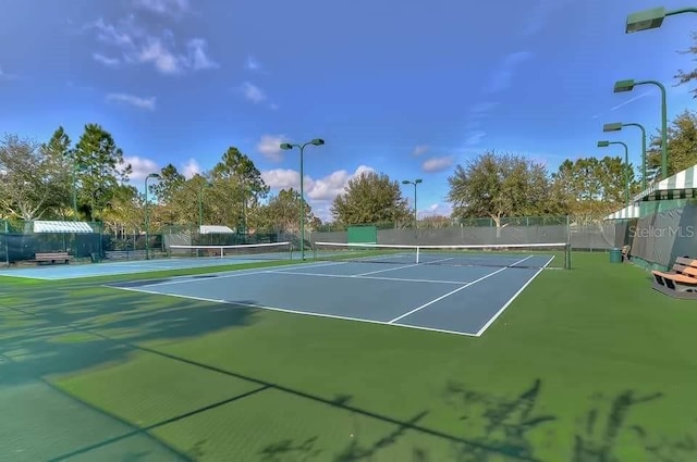 7010 Kendall Heath Way, Land O Lakes, FL 34637 - view of tennis court featuring community basketball court