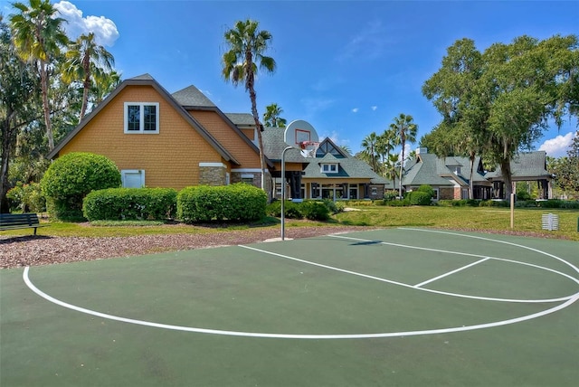 7010 Kendall Heath Way, Land O Lakes, FL 34637 - view of basketball court featuring community basketball court and a yard