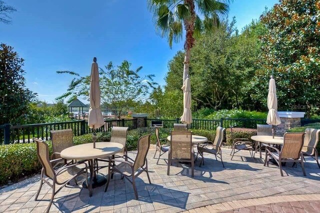 7010 Kendall Heath Way, Land O Lakes, FL 34637 - view of patio with outdoor dining space