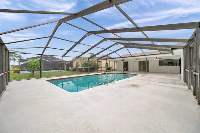 734 Flamingo Dr, Apollo Beach, FL 33572 - outdoor pool featuring ceiling fan, a patio area, and a lanai