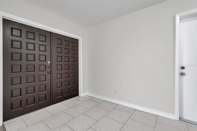 734 Flamingo Dr, Apollo Beach, FL 33572 - entrance foyer featuring light tile patterned floors