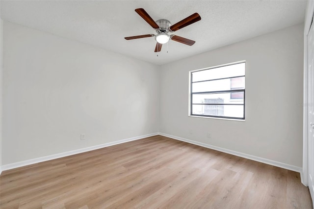 734 Flamingo Dr, Apollo Beach, FL 33572 - spare room with light wood-style floors and a ceiling fan