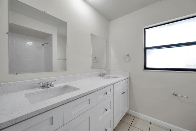 734 Flamingo Dr, Apollo Beach, FL 33572 - full bath featuring double vanity and tile patterned flooring