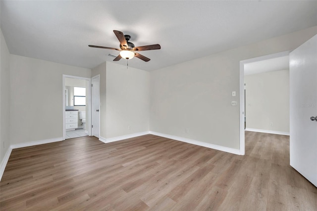 734 Flamingo Dr, Apollo Beach, FL 33572 - unfurnished room featuring ceiling fan and wood finished floors