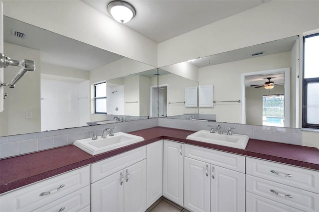 734 Flamingo Dr, Apollo Beach, FL 33572 - bathroom with double vanity and ceiling fan