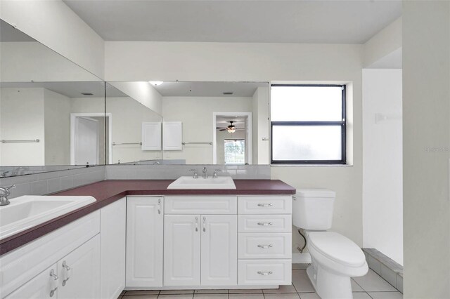 734 Flamingo Dr, Apollo Beach, FL 33572 - full bath featuring double vanity and tile patterned flooring