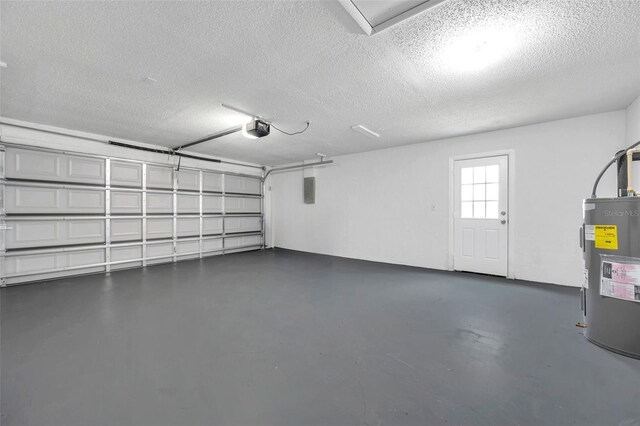 734 Flamingo Dr, Apollo Beach, FL 33572 - garage with a garage door opener, electric water heater, and electric panel