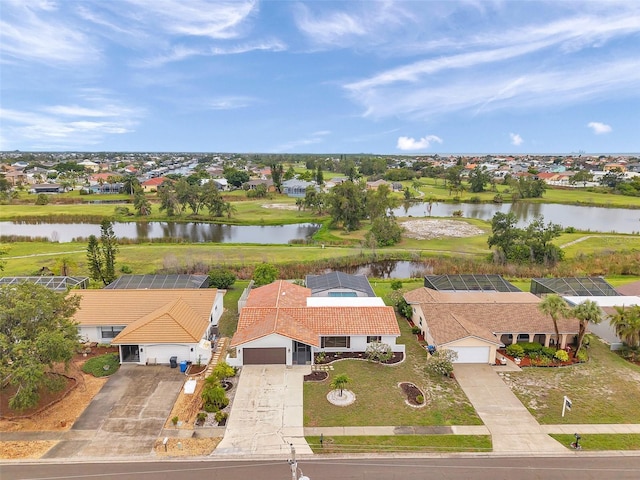 734 Flamingo Dr, Apollo Beach, FL 33572 - aerial perspective of suburban area featuring a large body of water