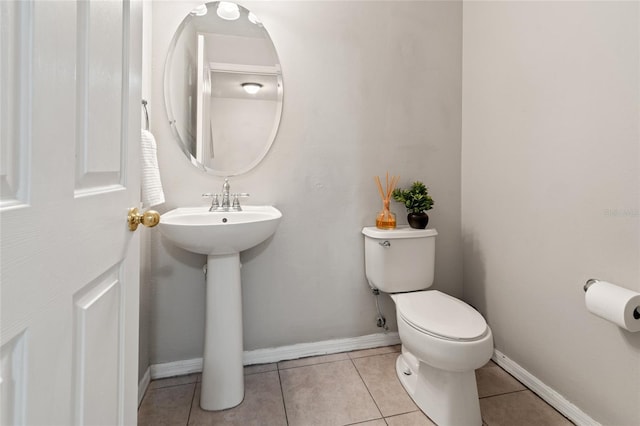17509 Queensland St, Land O Lakes, FL 34638 - bathroom with toilet and tile patterned flooring