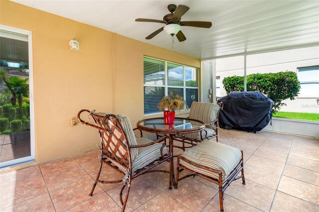 17509 Queensland St, Land O Lakes, FL 34638 - sunroom / solarium with ceiling fan, tile patterned floors, and outdoor dining space