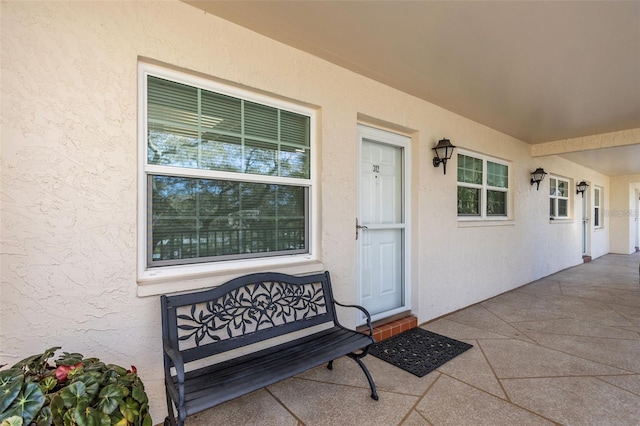 940 Virginia St Unit 303, Dunedin, FL 34698 - property entrance with stucco siding