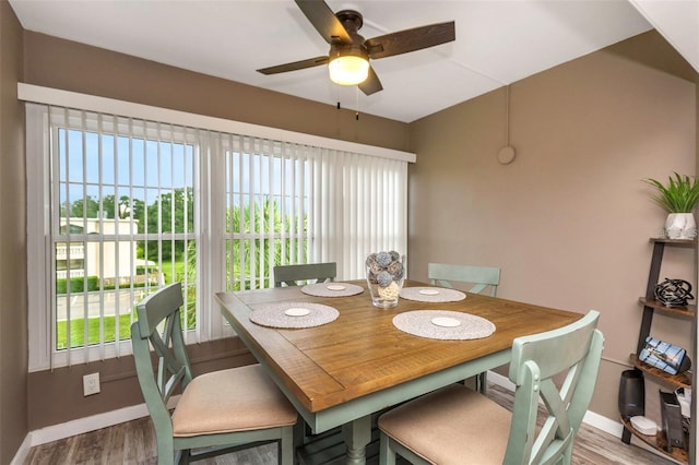 940 Virginia St Unit 303, Dunedin, FL 34698 - dining area featuring a ceiling fan and wood finished floors