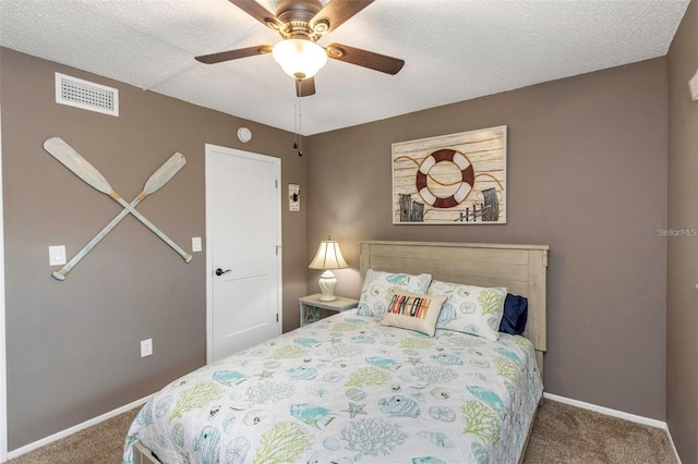 940 Virginia St Unit 303, Dunedin, FL 34698 - carpeted bedroom featuring baseboards and ceiling fan
