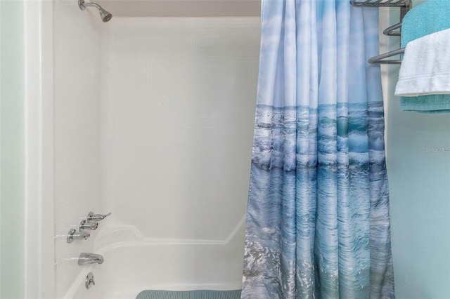 940 Virginia St Unit 303, Dunedin, FL 34698 - bathroom featuring shower / tub combo with curtain