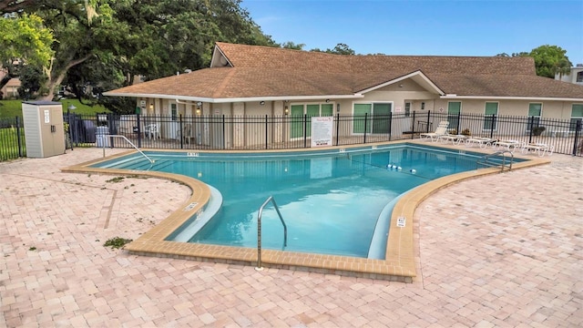 940 Virginia St Unit 303, Dunedin, FL 34698 - community pool with a patio