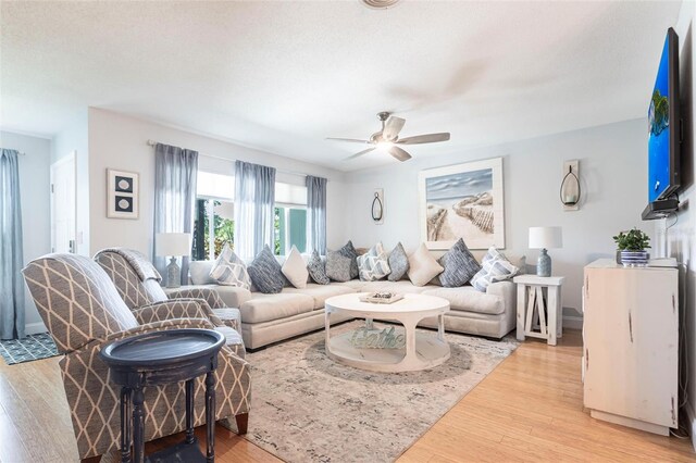 3312 Kenmore Dr, Sarasota, FL 34231 - living room with ceiling fan and light wood-type flooring