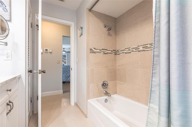 3312 Kenmore Dr, Sarasota, FL 34231 - full bath with shower / bathtub combination with curtain, tile patterned floors, vanity, and a ceiling fan