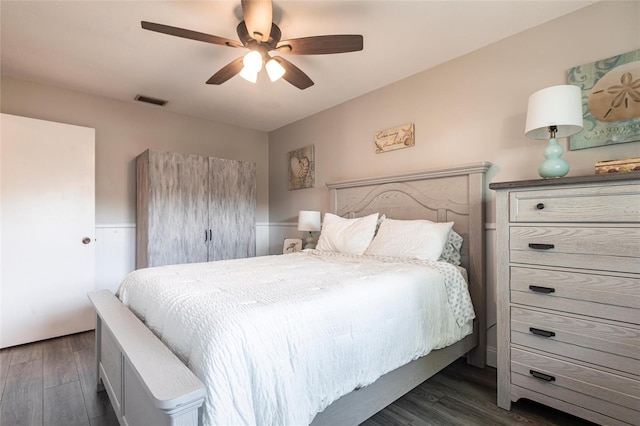 3312 Kenmore Dr, Sarasota, FL 34231 - bedroom with dark wood finished floors and a ceiling fan