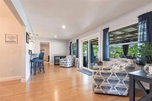 3312 Kenmore Dr, Sarasota, FL 34231 - living area featuring light wood finished floors and recessed lighting
