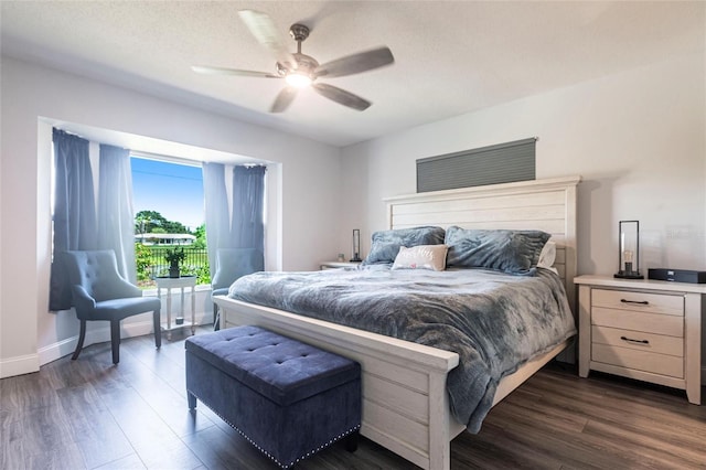 3312 Kenmore Dr, Sarasota, FL 34231 - bedroom with dark wood-style floors and ceiling fan