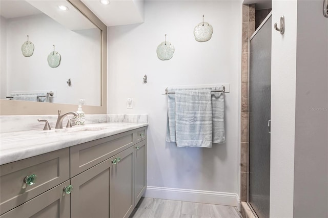 3312 Kenmore Dr, Sarasota, FL 34231 - bathroom with vanity and a stall shower