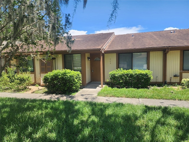209 Corkwood Ln, Oldsmar, FL 34677 - multi unit property with a shingled roof and stucco siding