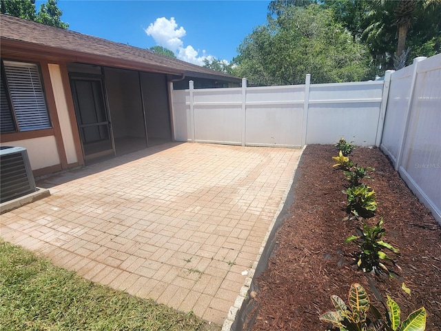 209 Corkwood Ln, Oldsmar, FL 34677 - fenced backyard featuring a patio