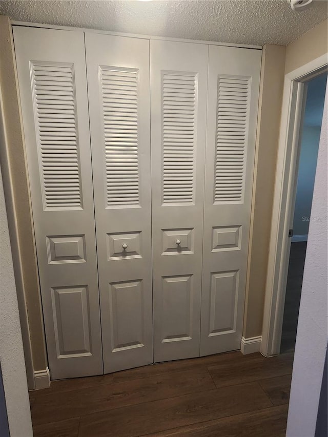 209 Corkwood Ln, Oldsmar, FL 34677 - detailed view of wood finished floors and a textured ceiling