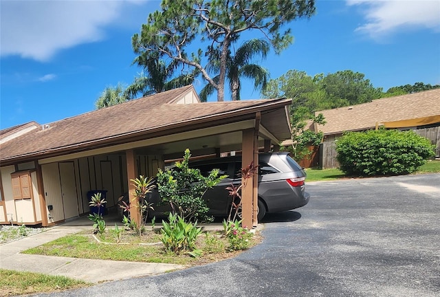 209 Corkwood Ln, Oldsmar, FL 34677 - view of front of home featuring board and batten siding