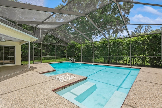 3262 Westcott Ct, Palm Harbor, FL 34684 - outdoor pool with a patio and glass enclosure