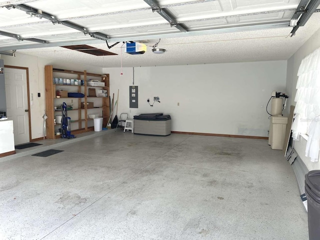 508 Alcazar Ct, Lady Lake, FL 32159 - garage with electric panel and a garage door opener