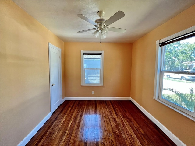 3110 10th Ave N, Saint Petersburg, FL 33713 - unfurnished room featuring dark wood-style floors and ceiling fan
