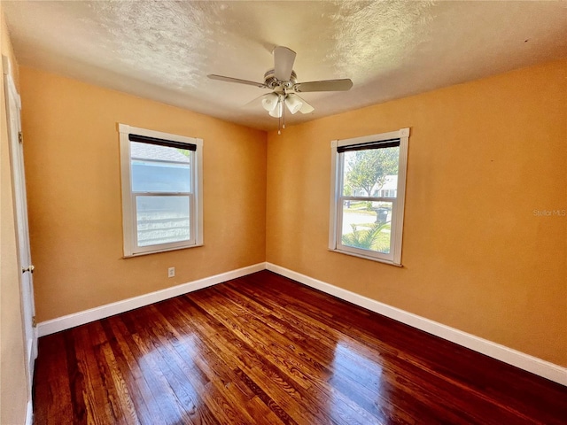 3110 10th Ave N, Saint Petersburg, FL 33713 - spare room with wood-type flooring, a textured ceiling, and ceiling fan