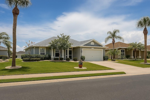 1607 Alexander Crossing Way, Sun City Center, FL 33573 - ranch-style house featuring driveway, an attached garage, a front lawn, and stucco siding