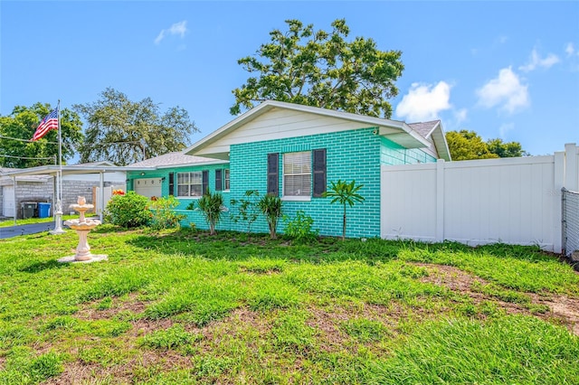 5107 Pine St, Seffner, FL 33584 - view of front of home featuring brick siding and an attached garage