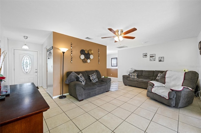5107 Pine St, Seffner, FL 33584 - living area featuring light tile patterned floors, ceiling fan, and healthy amount of natural light